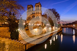 Notre Dame de Paris cathedral at dawn with the Seine River. Ile de La Cite, Paris, France