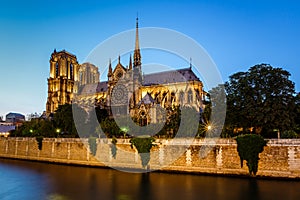 Notre Dame de Paris Cathedral and Seine River in the Evening