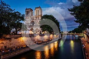 Notre Dame de Paris Cathedral and Seine River in the Evening