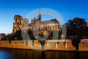 Notre Dame de Paris Cathedral and Seine River in the Evening