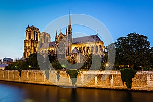 Notre Dame de Paris Cathedral and Seine River in the Evening photo