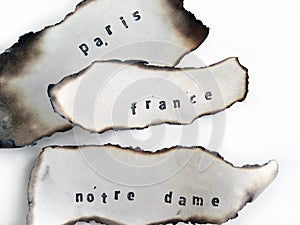 Notre Dame, Paris, France Stamped on an old burned Paper, Fire april 2019