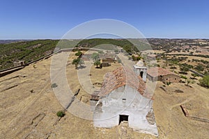 Noudar medieval castle courtyard; panorama, with Alentejo landscape background. and Located 5 kilometres from the Spanish border.