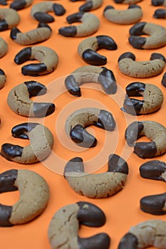 Nougat crescents cookies on orange