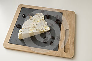 Nougat or torrone on cutting board