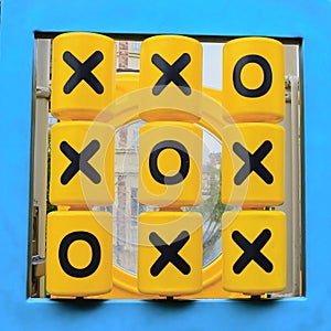 Noughts and Crosses game on outdoor children playground.