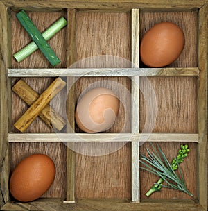 Noughts And Crosses Tic-tac-toe With Eggs And Herbs