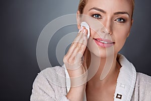 Nourished middle aged woman with perfect skin photo