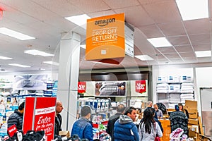 Nov 30, 2019 Mountain View / CA / USA - People waiting in line to return products at a Amazon Drop off returns area in a Kohl`s