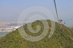 23 Nov 2019 Ngong Ping cable car with Chek Lap Kok airport in background, Hong Kong
