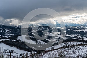 Nova Bystrica dam with snow covered hills around in Slovakia