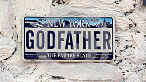 Novelty license plate featuring New York, Godfather, and The Empire State.