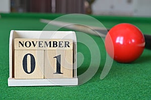 November 01, number cube on snooker table, sport background.