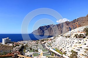 November 19 2021 - Puerto de Santiago, Tenerife, Spain: Coastal town and Gigantes cliffs