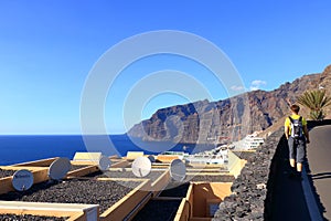 November 19 2021 - Puerto de Santiago, Tenerife, Spain: Coastal town and Gigantes cliffs