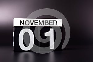 November 1st. Image of november 1 calendar on black background. Empty space for text