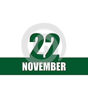november 22. 22th day of month, calendar date.Green numbers and stripe with white text on isolated background. Concept