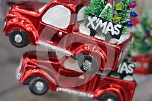 November 6, 2020, Moscow. Shiny toys in the form of cars on the Christmas tree, car purchase, loan