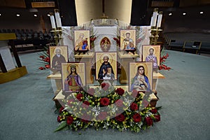 Decorated Church Altar on Solemnity of All Saints Day with icons floral candles