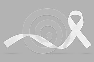 November Lung Cancer Awareness month, white Ribbon on grey background. Represents a mental health prevention program, mental