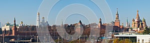 Moscow, Russia - Tourists admire the panorama of the Moscow Kremlin and St Basils Cathedral from Zaryadye Park