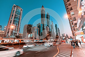 Sheikh Zayed road and numerous hotels and skyscrapers at night in Dubai