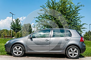 Silver car Volkswagen VW Golf 5 2.0 TDI Diesel parked on the street