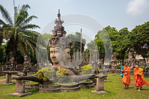 Novice Buddhist Monks at Xieng Khuan Buddha Park in Vientiane, Laos