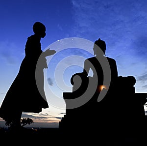 Novice Monk praying