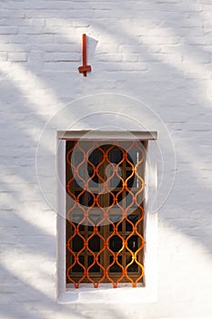 Novodevichy Monastery. Architecture of Novodevichy convent in Moscow. a window with a lattice in a white wall. UNESCO