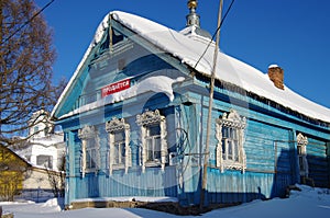 NOVOE, YAROSLAVSKAYA OBLAST, RUSSIA - February, 2018: The wooden old russian house in winter day