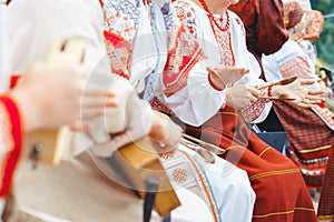 Novokuzneck, Russia - 01.07.2018: women in Russian costumes playing musical instruments