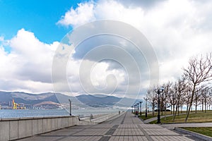 Novorossiysk, Russia - March 3, 2021: Panoramic view of the pedestrian embankment in Novorossiysk, Russia