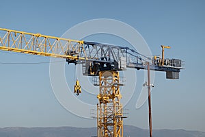 Novorossiysk Two hoisting cranes and buildings under construction photo