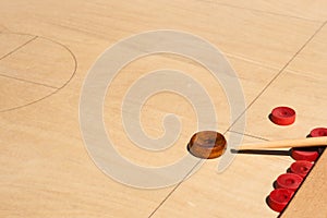 Novus game board and red disks