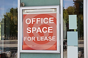 Office Space For Lease Sign On Door photo