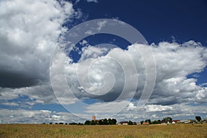 Nowa Cerkiew/pomorskie, Poland - July 20th 2013 : Rural landscape - village and a church.