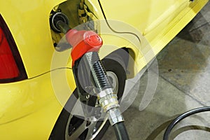 Nozzle fuel Gasoline serving in to the small car