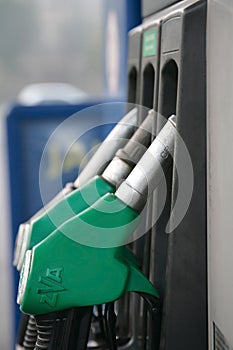 Nozzles at a petrol station photo