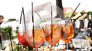 Nprocess of preparation of a cocktail Aperol spritz close-up.