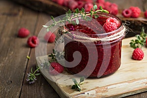 Raspberry jam with fresh raspberries and thyme. Raspberry fresh