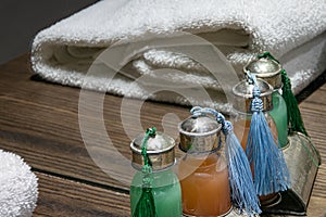 Reflection of towel, shampoo and gel in the mirror