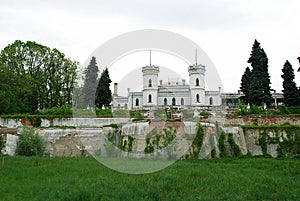 White castle in a picturesque park photo
