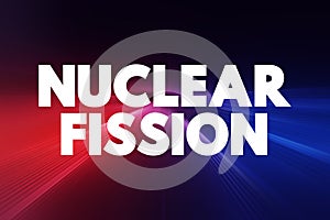 Nuclear Fission - reaction in which the nucleus of an atom splits into two or more smaller nuclei, text concept background
