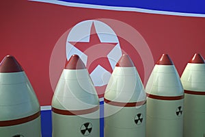 Nuclear missiles and North Korea flag in background. 3D rendered illustration