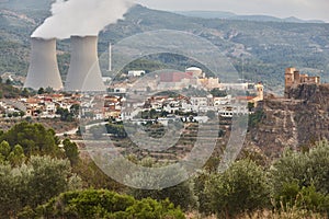 Nuclear power plant chimmey and castle in Cofrentes. Valencia, Spain