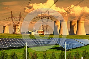 Nuclear power plant Dukovany with solar panels at sunset in Czech Republic