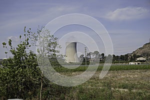 Nuclear power plant on the Rio Ebro in Spain with a cooling tower in a nice landscape photo