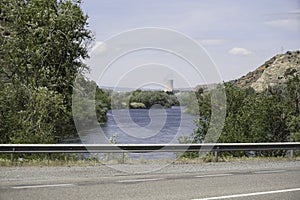 Nuclear power plant on the Rio Ebro in Spain with a cooling tower in a nice landscape photo