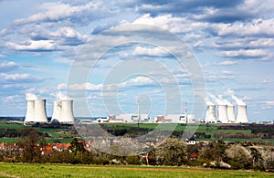 Nuclear power plant and spring time villag